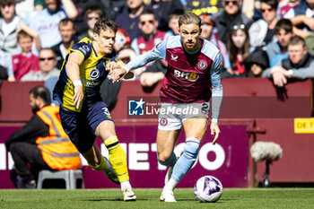 2024-04-21 - Aston Villa defender Matty Cash (2) and Milos Kerkez of Bournemouth during the English championship Premier League football match between Aston Villa and Bournemouth on 21 April 2024 at Villa Park in Birmingham, England - FOOTBALL - ENGLISH CHAMP - ASTON VILLA V BOURNEMOUTH - ENGLISH PREMIER LEAGUE - SOCCER