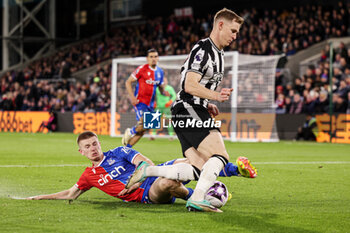 2024-04-24 - Adam Wharton of Crystal Palace tackles Emil Krafth of Newcastle during the English championship Premier League football match between Crystal Palace and Newcastle United on 24 April 2024 at Selhurst Park in London, England - FOOTBALL - ENGLISH CHAMP - CRYSTAL PALACE V NEWCASTLE - ENGLISH PREMIER LEAGUE - SOCCER