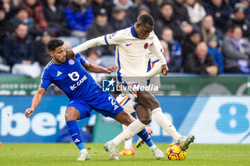 2024-11-23 - Chelsea forward Nicolas Jackson (15) battles for possession with Leicester City defender James Justin (2) during the English championship Premier League football match between Leicester City and Chelsea on 23 November 2024 at the King Power Stadium in Leicester, England - FOOTBALL - ENGLISH CHAMP - LEICESTER V CHELSEA - ENGLISH PREMIER LEAGUE - SOCCER