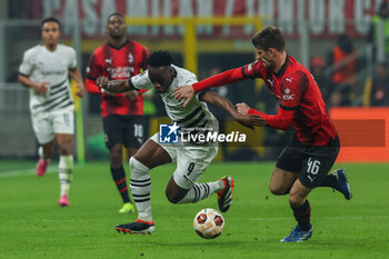 2024-02-15 - Arnaud Kalimuendo of Stade Rennais FC competes for the ball with Matteo Gabbia of AC Milan during UEFA Europa League 2023/24 Play-Off - 1st  leg football match between AC Milan and Rennes Stade Rennais FC at San Siro Stadium, Milan, Italy on February 15, 2024 - AC MILAN VS RENNAIS FC - UEFA EUROPA LEAGUE - SOCCER