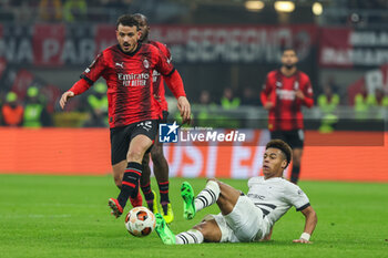 2024-02-15 - Alessandro Florenzi of AC Milan competes for the ball with Desire Doue of Stade Rennais FC during UEFA Europa League 2023/24 Play-Off - 1st  leg football match between AC Milan and Rennes Stade Rennais FC at San Siro Stadium, Milan, Italy on February 15, 2024 - AC MILAN VS RENNAIS FC - UEFA EUROPA LEAGUE - SOCCER
