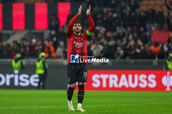 2024-02-15 - Theo Hernandez of AC Milan celebrates the victory at the end of the match during UEFA Europa League 2023/24 Play-Off - 1st  leg football match between AC Milan and Rennes Stade Rennais FC at San Siro Stadium, Milan, Italy on February 15, 2024 - AC MILAN VS RENNAIS FC - UEFA EUROPA LEAGUE - SOCCER