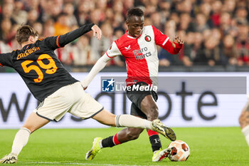 2024-02-15 - Yankuba Minteh of Feyenoord is challenged by Nicola Zalewski of AS Roma during the UEFA Europe League, Play-off 1st leg football match between Feyenoord and AS Roma on February 15, 2024 at Stadion Feijenoord in Rotterdam, Netherlands - FOOTBALL - EUROPA LEAGUE - FEYENOORD V ROMA - UEFA EUROPA LEAGUE - SOCCER