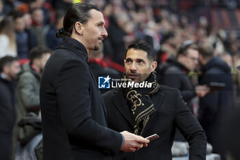2024-02-22 - Zlatan Ibrahimovic and Geoffrey Moncada of AC Milan during the UEFA Europa League, Play-off 2nd leg football match between Stade Rennais (Rennes) and AC Milan on February 22, 2024 at Roazhon Park in Rennes, France - FOOTBALL - EUROPA LEAGUE - RENNES V MILAN - UEFA EUROPA LEAGUE - SOCCER