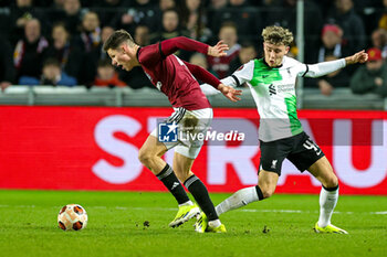 2024-03-08 - Martin Vitik of Sparta Prague and Bobby Clark (42) of Liverpool during the UEFA Europa League, Round of 16, 1st leg football match between Sparta Prague and Liverpool on 7 March 2024 at epet ARENA in Prague, Czech Republic - FOOTBALL - EUROPA LEAGUE - SPARTA PRAGUE V LIVERPOOL - UEFA EUROPA LEAGUE - SOCCER