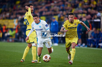 2024-03-14 - Amine Harit of Olympique de Marseille competes for the ball with Dani Parejo (L) and Kiko Femenia (R) of Villarreal during the UEFA Europa League, Round of 16, 2nd leg football match between Villarreal CF and Olympique de Marseille on March 14, 2024 at Estadio de la Ceramica in Villarreal, Spain - FOOTBALL - EUROPA LEAGUE - VILLARREAL V MARSEILLE - UEFA EUROPA LEAGUE - SOCCER
