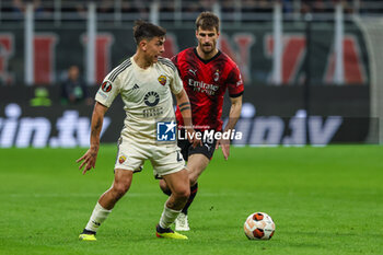 2024-04-11 - Paulo Dybala of AS Roma competes for the ball with Matteo Gabbia of AC Milan during UEFA Europa League 2023/24 Quarter Finals - 1st  leg football match between AC Milan and AS Roma at San Siro Stadium, Milan, Italy on April 11, 2024 - AC MILAN VS AS ROMA - UEFA EUROPA LEAGUE - SOCCER