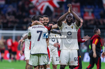 2024-04-11 - Romelu Lukaku of AS Roma, Lorenzo Pellegrini of AS Roma and Paulo Dybala of AS Roma celebrate the victory at the end of the match during UEFA Europa League 2023/24 Quarter Finals - 1st  leg football match between AC Milan and AS Roma at San Siro Stadium, Milan, Italy on April 11, 2024 - AC MILAN VS AS ROMA - UEFA EUROPA LEAGUE - SOCCER