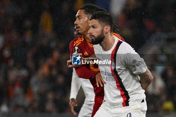 2024-04-18 - Chris Smalling of A.S. Roma and Olivier Giroud of A.C. Milan during the UEFA Europa League Quarter-final second Leg match, between A.S. Roma vs A.C. Milan at the Olympic Stadium on April 18, 2024 in Rome, Italy. - AS ROMA VS AC MILAN - UEFA EUROPA LEAGUE - SOCCER