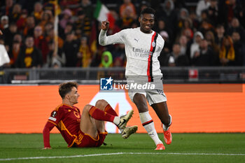 2024-04-18 - Diego Llorente of A.S. Roma and Rafael Leao of A.C. Milan during the UEFA Europa League Quarter-final second Leg match, between A.S. Roma vs A.C. Milan at the Olympic Stadium on April 18, 2024 in Rome, Italy. - AS ROMA VS AC MILAN - UEFA EUROPA LEAGUE - SOCCER