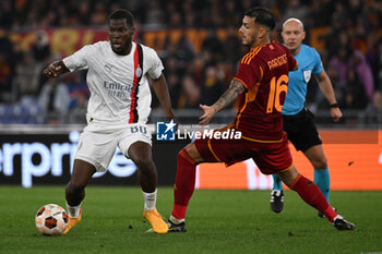 2024-04-18 - Yunus Musah of A.C. Milan and Leandro Paredes of A.S. Roma during the UEFA Europa League Quarter-final second Leg match, between A.S. Roma vs A.C. Milan at the Olympic Stadium on April 18, 2024 in Rome, Italy. - AS ROMA VS AC MILAN - UEFA EUROPA LEAGUE - SOCCER