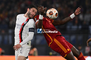 2024-04-18 - Davide Calabria of A.C. Milan and Tammy Abraham of A.S. Roma during the UEFA Europa League Quarter-final second Leg match, between A.S. Roma vs A.C. Milan at the Olympic Stadium on April 18, 2024 in Rome, Italy. - AS ROMA VS AC MILAN - UEFA EUROPA LEAGUE - SOCCER