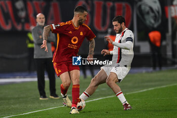 2024-04-18 - Leonardo Spinazzola of A.S. Roma and Davide Calabria of A.C. Milan during the UEFA Europa League Quarter-final second Leg match, between A.S. Roma vs A.C. Milan at the Olympic Stadium on April 18, 2024 in Rome, Italy. - AS ROMA VS AC MILAN - UEFA EUROPA LEAGUE - SOCCER