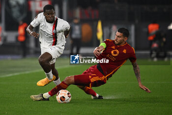 2024-04-18 - Yunus Musah of A.C. Milan and Lorenzo Pellegrini of A.S. Roma during the UEFA Europa League Quarter-final second Leg match, between A.S. Roma vs A.C. Milan at the Olympic Stadium on April 18, 2024 in Rome, Italy. - AS ROMA VS AC MILAN - UEFA EUROPA LEAGUE - SOCCER