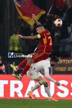 2024-04-18 - Gianluca Mancini of A.S. Roma and Olivier Giroud of A.C. Milan during the UEFA Europa League Quarter-final second Leg match, between A.S. Roma vs A.C. Milan at the Olympic Stadium on April 18, 2024 in Rome, Italy. - AS ROMA VS AC MILAN - UEFA EUROPA LEAGUE - SOCCER