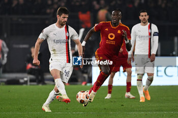 2024-04-18 - Matteo Gabbia A.C. Milan and Tammy Abraham of A.S. Roma during the UEFA Europa League Quarter-final second Leg match, between A.S. Roma vs A.C. Milan at the Olympic Stadium on April 18, 2024 in Rome, Italy. - AS ROMA VS AC MILAN - UEFA EUROPA LEAGUE - SOCCER