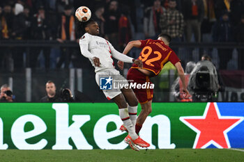 2024-04-18 - Rafael Leao of A.C. Milan and Stephan El Shaarawy of A.S. Roma during the UEFA Europa League Quarter-final second Leg match, between A.S. Roma vs A.C. Milan at the Olympic Stadium on April 18, 2024 in Rome, Italy. - AS ROMA VS AC MILAN - UEFA EUROPA LEAGUE - SOCCER