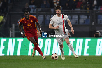 2024-04-18 - Tammy Abraham of A.S. Roma and Matteo Gabbia A.C. Milan during the UEFA Europa League Quarter-final second Leg match, between A.S. Roma vs A.C. Milan at the Olympic Stadium on April 18, 2024 in Rome, Italy. - AS ROMA VS AC MILAN - UEFA EUROPA LEAGUE - SOCCER