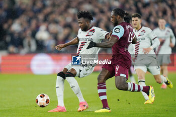 2024-04-18 - Edmond Tapsoba of Bayer Leverkusen under pressure from Michail Antonio of West Ham during the UEFA Europa League, Quater-Finals, 2nd Leg football match between West Ham United FC and Bayer 04 Leverkusen on 18 April 2024 at London Stadium in London, England - FOOTBALL - EUROPA LEAGUE - WEST HAM V BAYER LEVERKUSEN - UEFA EUROPA LEAGUE - SOCCER