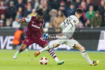 2024-04-18 - Mohammed Kudus of West Ham United under pressure from Exequiel Palacios of Bayer Leverkusen during the UEFA Europa League, Quater-Finals, 2nd Leg football match between West Ham United FC and Bayer 04 Leverkusen on 18 April 2024 at London Stadium in London, England - FOOTBALL - EUROPA LEAGUE - WEST HAM V BAYER LEVERKUSEN - UEFA EUROPA LEAGUE - SOCCER