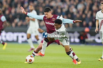 2024-04-18 - Edson Alvarez of West Ham United and Nathan Tella of Bayer Leverkusen during the UEFA Europa League, Quater-Finals, 2nd Leg football match between West Ham United FC and Bayer 04 Leverkusen on 18 April 2024 at London Stadium in London, England - FOOTBALL - EUROPA LEAGUE - WEST HAM V BAYER LEVERKUSEN - UEFA EUROPA LEAGUE - SOCCER