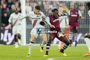 2024-04-18 - Exequiel Palacios of Bayer Leverkusen and Michail Antonio of West Ham during the UEFA Europa League, Quater-Finals, 2nd Leg football match between West Ham United FC and Bayer 04 Leverkusen on 18 April 2024 at London Stadium in London, England - FOOTBALL - EUROPA LEAGUE - WEST HAM V BAYER LEVERKUSEN - UEFA EUROPA LEAGUE - SOCCER