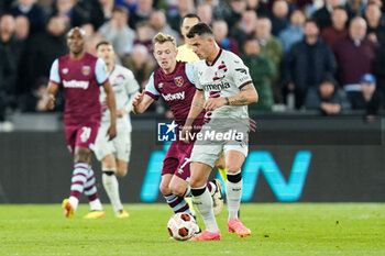 2024-04-18 - Granit Xhaka of Bayer Leverkusen under pressure from James Ward-Prowse of West Ham during the UEFA Europa League, Quater-Finals, 2nd Leg football match between West Ham United FC and Bayer 04 Leverkusen on 18 April 2024 at London Stadium in London, England - FOOTBALL - EUROPA LEAGUE - WEST HAM V BAYER LEVERKUSEN - UEFA EUROPA LEAGUE - SOCCER