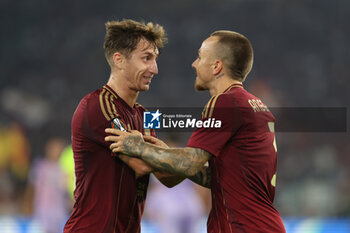 2024-09-26 - Rome, Italy 26.9.2024: Tommaso Baldanzi of Roma, Angelino of Roma score the goal and celebrate with the team during the UEFA Europa League 2024-2025 day 1, football match between AS Roma vs Athletic Club Bilbao at Olympic Stadium in Rome. - AS ROMA VS ATHLETIC BILBAO - UEFA EUROPA LEAGUE - SOCCER