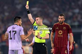 2024-09-26 - Rome, Italy 26.9.2024: Referee Kabakov extract yellow card for Yuri of Athletic Bilbao during the UEFA Europa League 2024-2025 day 1, football match between AS Roma vs Athletic Club Bilbao at Olympic Stadium in Rome. - AS ROMA VS ATHLETIC BILBAO - UEFA EUROPA LEAGUE - SOCCER