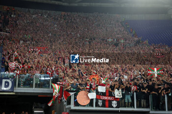 2024-09-26 - Rome, Italy 26.9.2024: Athletic Bilbao supporters celebrate at the end of the match for throwing smoke bombs at the opposing fans in the UEFA Europa League 2024-2025 day 1, football match between AS Roma vs Athletic Club Bilbao at Olympic Stadium in Rome. - AS ROMA VS ATHLETIC BILBAO - UEFA EUROPA LEAGUE - SOCCER