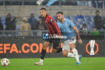 2024-10-03 - Badredine Bouanani of O.G.C. Nice and Mario Gila of S.S. Lazio in action during the UEFA Europa League 2024/25 League Phase MD2 match between S.S. Lazio and O.G.C. Nice at Olympic Stadium on October 3, 2024 in Rome, Italy. - SS LAZIO VS OGC NICE - UEFA EUROPA LEAGUE - SOCCER