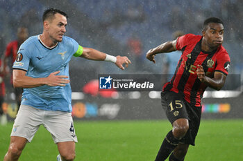 2024-10-03 - Patric of S.S. Lazio and Youssoufa Moukoko of O.G.C. Nice in action during the UEFA Europa League 2024/25 League Phase MD2 match between S.S. Lazio and O.G.C. Nice at Olympic Stadium on October 3, 2024 in Rome, Italy. - SS LAZIO VS OGC NICE - UEFA EUROPA LEAGUE - SOCCER