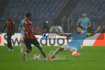 2024-10-03 - Moise Bombito of O.G.C. Nice and Mattia Zaccagni of S.S. Lazio in action during the UEFA Europa League 2024/25 League Phase MD2 match between S.S. Lazio and O.G.C. Nice at Olympic Stadium on October 3, 2024 in Rome, Italy. - SS LAZIO VS OGC NICE - UEFA EUROPA LEAGUE - SOCCER