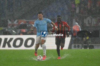 2024-10-03 - Luca Pellegrini of S.S. Lazio and Tanguy NDombele of O.G.C. Nice in action during the UEFA Europa League 2024/25 League Phase MD2 match between S.S. Lazio and O.G.C. Nice at Olympic Stadium on October 3, 2024 in Rome, Italy. - SS LAZIO VS OGC NICE - UEFA EUROPA LEAGUE - SOCCER