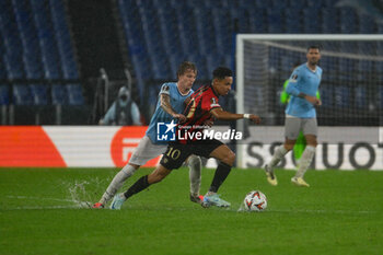 2024-10-03 - Nicolo Rovella of S.S. Lazio and Sofiane Diop of O.G.C. Nice in action during the UEFA Europa League 2024/25 League Phase MD2 match between S.S. Lazio and O.G.C. Nice at Olympic Stadium on October 3, 2024 in Rome, Italy. - SS LAZIO VS OGC NICE - UEFA EUROPA LEAGUE - SOCCER