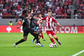 2024-10-03 - 96 Christos Mouzakitis of Olympiacos FC is playing during the Europa League, Matchday 2 match between Olympiacos FC and SC Braga at Georgios Karaiskakis Stadium on October 3, 2024, in Piraeus, Greece. - OLYMPIACOS FC VS SC BRAGA - UEFA EUROPA LEAGUE - SOCCER