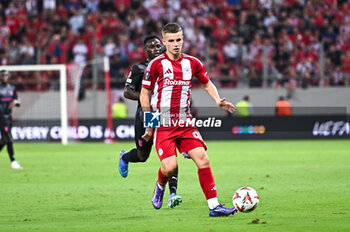 2024-10-03 - 96 Christos Mouzakitis of Olympiacos FC is playing during the Europa League, Matchday 2 match between Olympiacos FC and SC Braga at Georgios Karaiskakis Stadium on October 3, 2024, in Piraeus, Greece. - OLYMPIACOS FC VS SC BRAGA - UEFA EUROPA LEAGUE - SOCCER