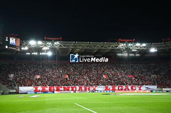 2024-10-03 - Olympiacos FC supporters are having fun during the Europa League, Matchday 2 match between Olympiacos FC and SC Braga at Georgios Karaiskakis Stadium on October 3, 2024, in Piraeus, Olympiacos FC. - OLYMPIACOS FC VS SC BRAGA - UEFA EUROPA LEAGUE - SOCCER