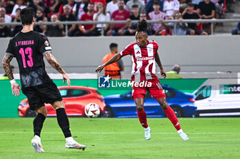 2024-10-03 - 10 Gelson Martins of Olympiacos FC competing with 13 Joao Ferreira of SC Braga during the Europa League, Matchday 2 match between Olympiacos FC and SC Braga at Georgios Karaiskakis Stadium on October 3, 2024, in Piraeus, Greece. - OLYMPIACOS FC VS SC BRAGA - UEFA EUROPA LEAGUE - SOCCER