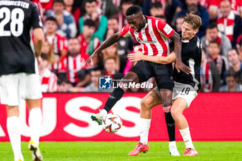 2024-10-03 - David Moller Wolfe of AZ Alkmaar and Inaki Williams of Athletic Club during the UEFA Europa League, League Phase, Matchday 2 football match between Athletic Club and AZ Alkmaar on October 3, 2024 at Estadio de San Mamés in Bilbao, Spain - FOOTBALL - EUROPA LEAGUE - ATHLETIC CLUB V AZ ALKMAAR - UEFA EUROPA LEAGUE - SOCCER