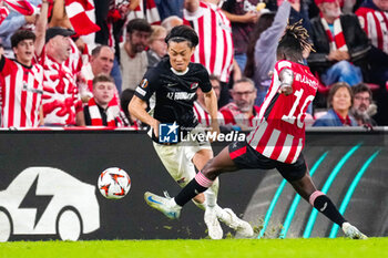 2024-10-03 - Seiya Maikuma of AZ Alkmaar battles for possession with Nico Williams of Athletic Club during the UEFA Europa League, League Phase, Matchday 2 football match between Athletic Club and AZ Alkmaar on October 3, 2024 at Estadio de San Mamés in Bilbao, Spain - FOOTBALL - EUROPA LEAGUE - ATHLETIC CLUB V AZ ALKMAAR - UEFA EUROPA LEAGUE - SOCCER