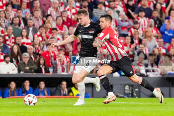 2024-10-03 - Peer Koopmeiners of AZ Alkmaar battles for possession with Yuri Berchiche of Athletic Club during the UEFA Europa League, League Phase, Matchday 2 football match between Athletic Club and AZ Alkmaar on October 3, 2024 at Estadio de San Mamés in Bilbao, Spain - FOOTBALL - EUROPA LEAGUE - ATHLETIC CLUB V AZ ALKMAAR - UEFA EUROPA LEAGUE - SOCCER