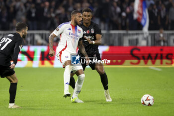 2024-10-24 - Corentin Tolisso of Lyon, Felix Uduokhai of Besiktas during the UEFA Europa League, League phase, matchday 3 football match between Olympique Lyonnais (Lyon) and Besiktas JK on 24 October 2024 at Groupama stadium in Decines-Charpieu near Lyon, France - FOOTBALL - EUROPA LEAGUE - LYON V BESIKTAS - UEFA EUROPA LEAGUE - SOCCER