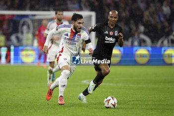 2024-10-24 - Rayan Cherki of Lyon, Joao Mario of Besiktas during the UEFA Europa League, League phase, matchday 3 football match between Olympique Lyonnais (Lyon) and Besiktas JK on 24 October 2024 at Groupama stadium in Decines-Charpieu near Lyon, France - FOOTBALL - EUROPA LEAGUE - LYON V BESIKTAS - UEFA EUROPA LEAGUE - SOCCER