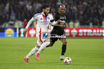 2024-10-24 - Rayan Cherki of Lyon, Joao Mario of Besiktas during the UEFA Europa League, League phase, matchday 3 football match between Olympique Lyonnais (Lyon) and Besiktas JK on 24 October 2024 at Groupama stadium in Decines-Charpieu near Lyon, France - FOOTBALL - EUROPA LEAGUE - LYON V BESIKTAS - UEFA EUROPA LEAGUE - SOCCER