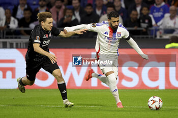 2024-10-24 - Said Benrahma of Lyon, left Jonas Svensson of Besiktas during the UEFA Europa League, League phase, matchday 3 football match between Olympique Lyonnais (Lyon) and Besiktas JK on 24 October 2024 at Groupama stadium in Decines-Charpieu near Lyon, France - FOOTBALL - EUROPA LEAGUE - LYON V BESIKTAS - UEFA EUROPA LEAGUE - SOCCER