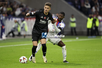 2024-10-24 - Ernest Muci of Besiktas, Ainsley Maitland-Niles of Lyon during the UEFA Europa League, League phase, matchday 3 football match between Olympique Lyonnais (Lyon) and Besiktas JK on 24 October 2024 at Groupama stadium in Decines-Charpieu near Lyon, France - FOOTBALL - EUROPA LEAGUE - LYON V BESIKTAS - UEFA EUROPA LEAGUE - SOCCER