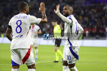 2024-10-24 - Alexandre Lacazette of Lyon celebrates his goal with Corentin Tolisso (left) - a goal ultimately cancelled - during the UEFA Europa League, League phase, matchday 3 football match between Olympique Lyonnais (Lyon) and Besiktas JK on 24 October 2024 at Groupama stadium in Decines-Charpieu near Lyon, France - FOOTBALL - EUROPA LEAGUE - LYON V BESIKTAS - UEFA EUROPA LEAGUE - SOCCER