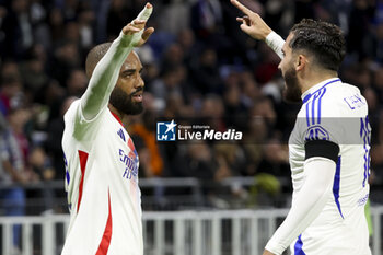 2024-10-24 - Alexandre Lacazette of Lyon celebrates his goal with Rayan Cherki - a goal ultimately cancelled - during the UEFA Europa League, League phase, matchday 3 football match between Olympique Lyonnais (Lyon) and Besiktas JK on 24 October 2024 at Groupama stadium in Decines-Charpieu near Lyon, France - FOOTBALL - EUROPA LEAGUE - LYON V BESIKTAS - UEFA EUROPA LEAGUE - SOCCER