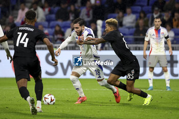 2024-10-24 - Rayan Cherki of Lyon, Gedson Fernandes of Besiktas during the UEFA Europa League, League phase, matchday 3 football match between Olympique Lyonnais (Lyon) and Besiktas JK on 24 October 2024 at Groupama stadium in Decines-Charpieu near Lyon, France - FOOTBALL - EUROPA LEAGUE - LYON V BESIKTAS - UEFA EUROPA LEAGUE - SOCCER